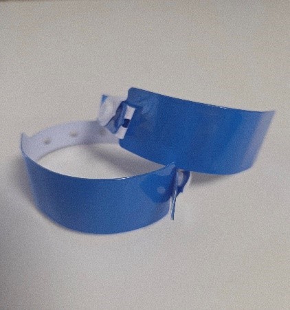 Image of two blue wristbands. 