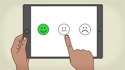 An ipad displaying a sad, happy and indifferent face for people to give feedback.